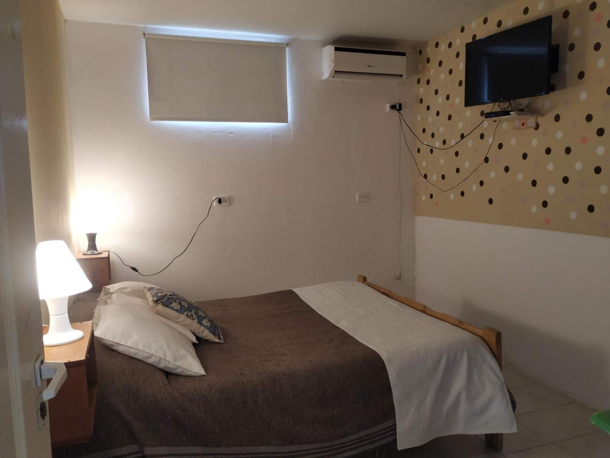 Hotel Complejo Aloha Puerto Pirámides Habitación foto